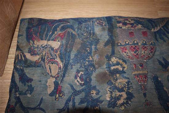 A blue brocade figurative hanging with metal thread embroidery and velvet border